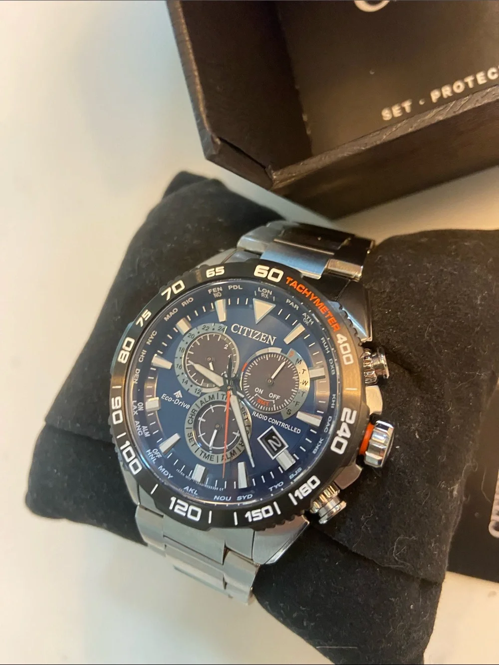 Citizen Eco-Drive Stainless Watch with Blue Dial and Silver Bracelet.. sapphire